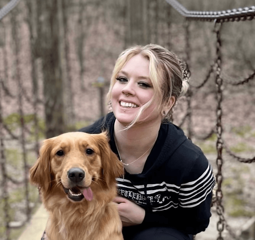 Kelsie Dawson with a golden retriever